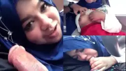 Tante Berjilbab Mengocok Kontol Di Dalam Mobil